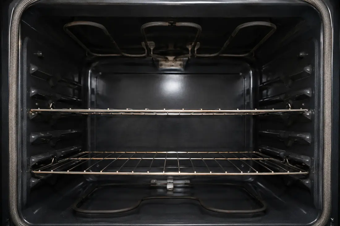 Oven cavity showing bake and broil heating elements