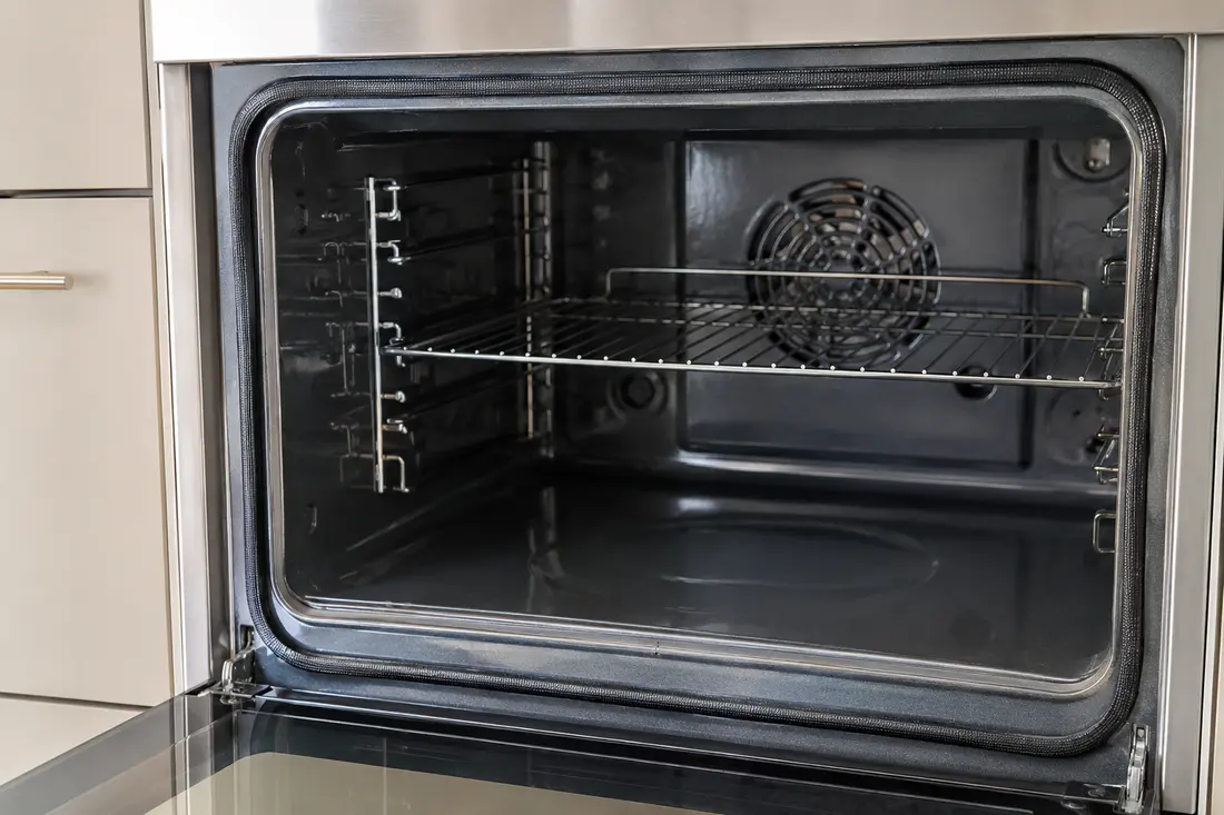 Modern built-in oven with a worn door gasket