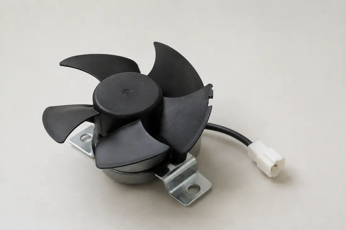 Freezer evaporator fan assembly with one chipped blade